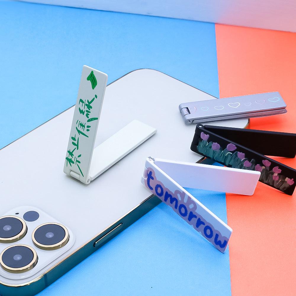 100pcs Ultra-Thin Cell Phone Holder | Adjustable Mini Portable Foldable Phone Stand