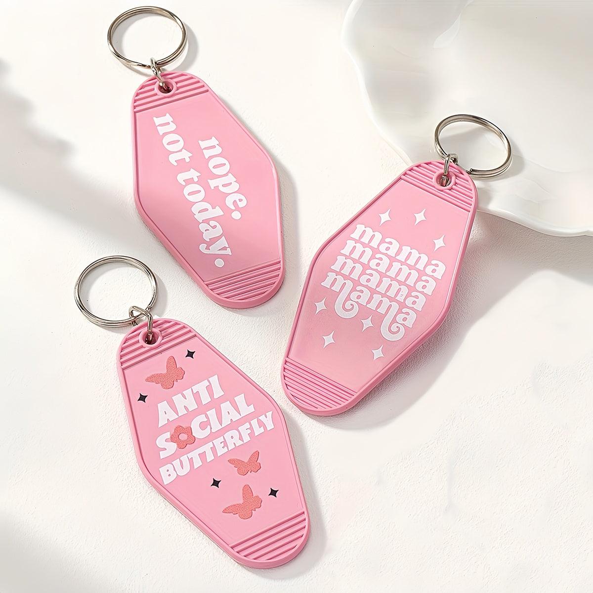 Pink UV printed keychains with cute phrases, ideal for business gifts and hotel key rings.